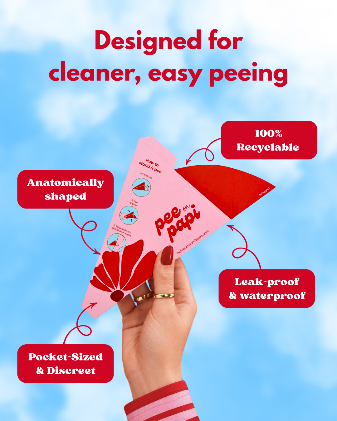 A hand holds a pink and red disposable pee funnel called pee on papi, against a light blue sky background with text callouts highlighting its features: 'Designed for cleaner, easy peeing,' 'Anatomically shaped,' '100% Recyclable,' 'Leak-proof & waterproof,' and 'Pocket-Sized & Discrete.'
